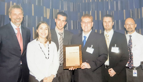 Dan managing a team to the Chairman's award for innovation